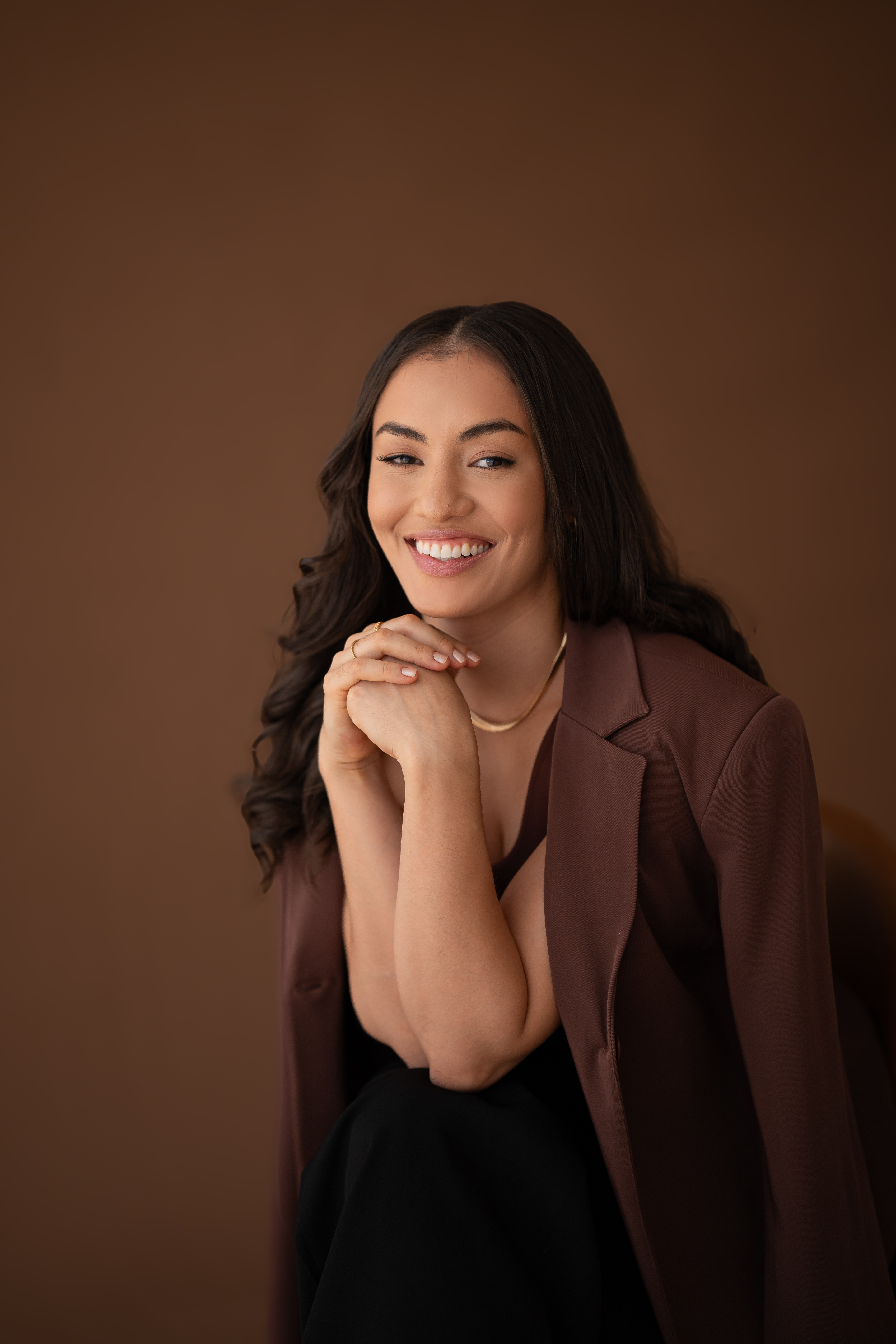 Ellen Pessoa - Nutricionista sorrindo em seu consultório